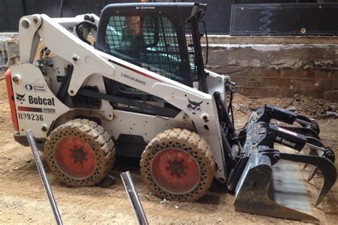 towing skid steer with 3/4 ton|chevy silverado skid steer weights.